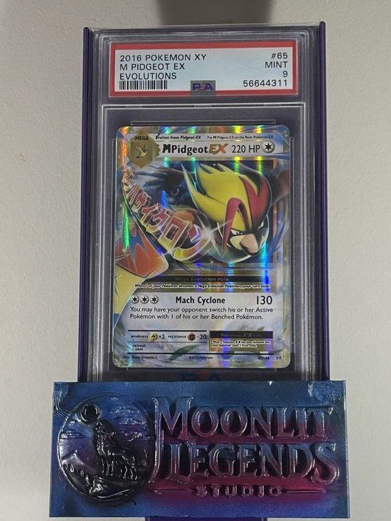M Pidgeot EX – Evolutions #65/108 (PSA 9 MINT)
